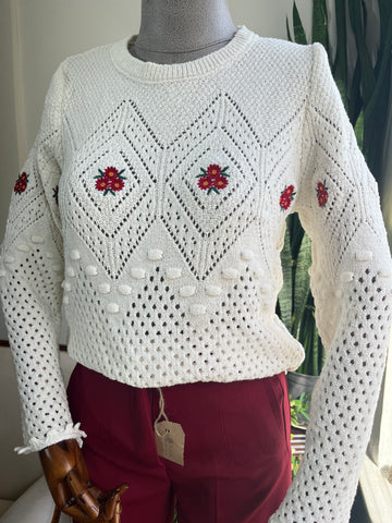 Chic White Crew Neck Sweater with Pom-Pom & Red Flower Details – Cozy & Stylish for Any Occasion